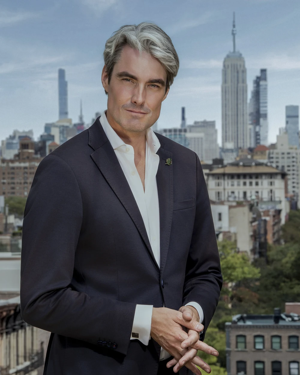 Executive portrait against the New York skyline by Javi Alvarez