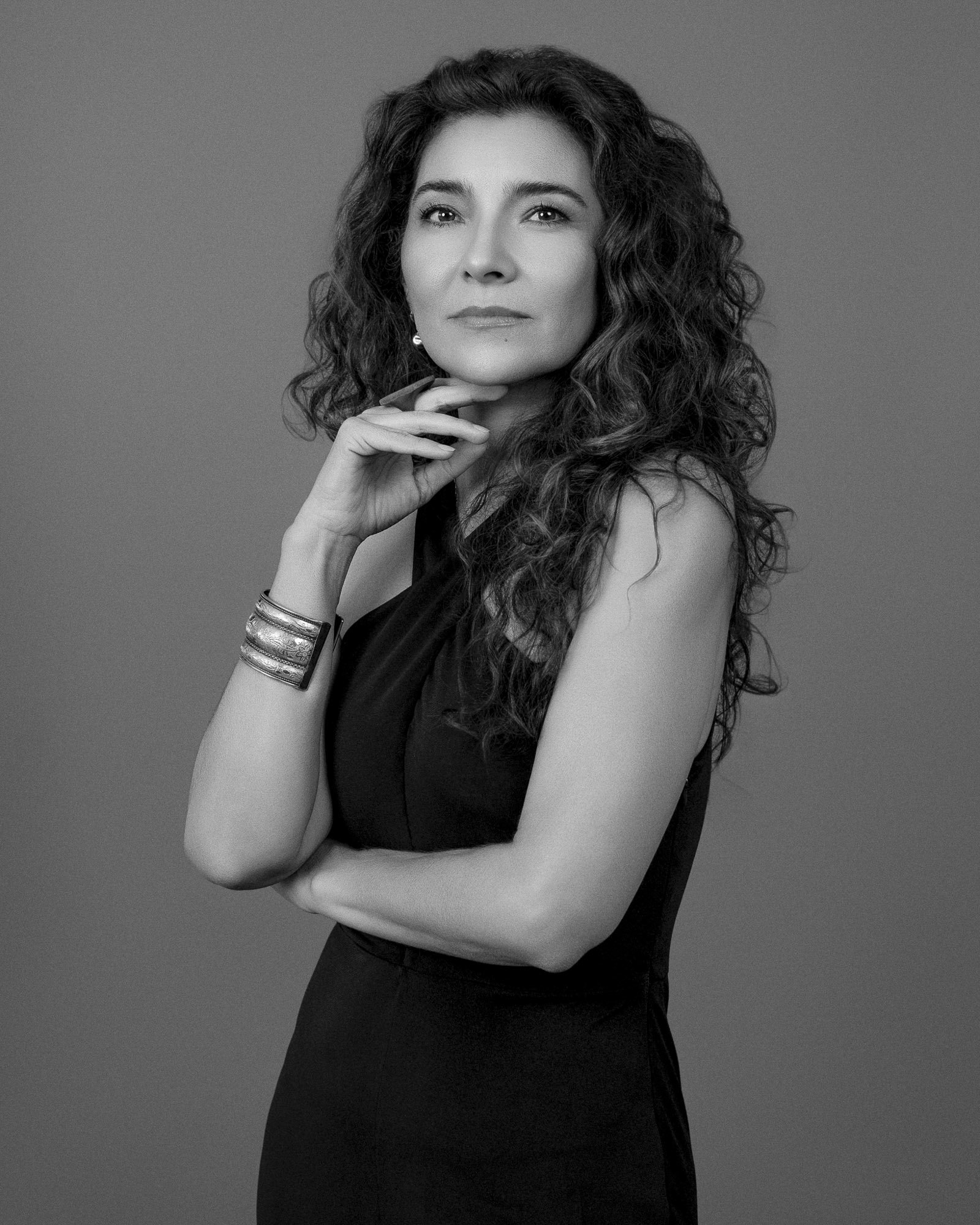 Black and white editorial portrait of a woman